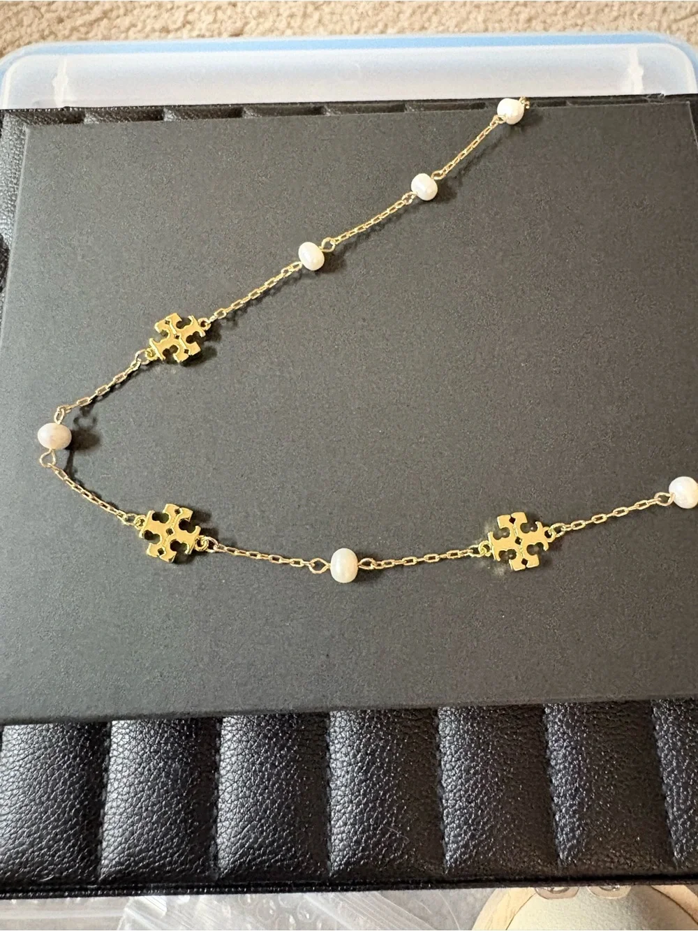Tory Burch gold lightweight or